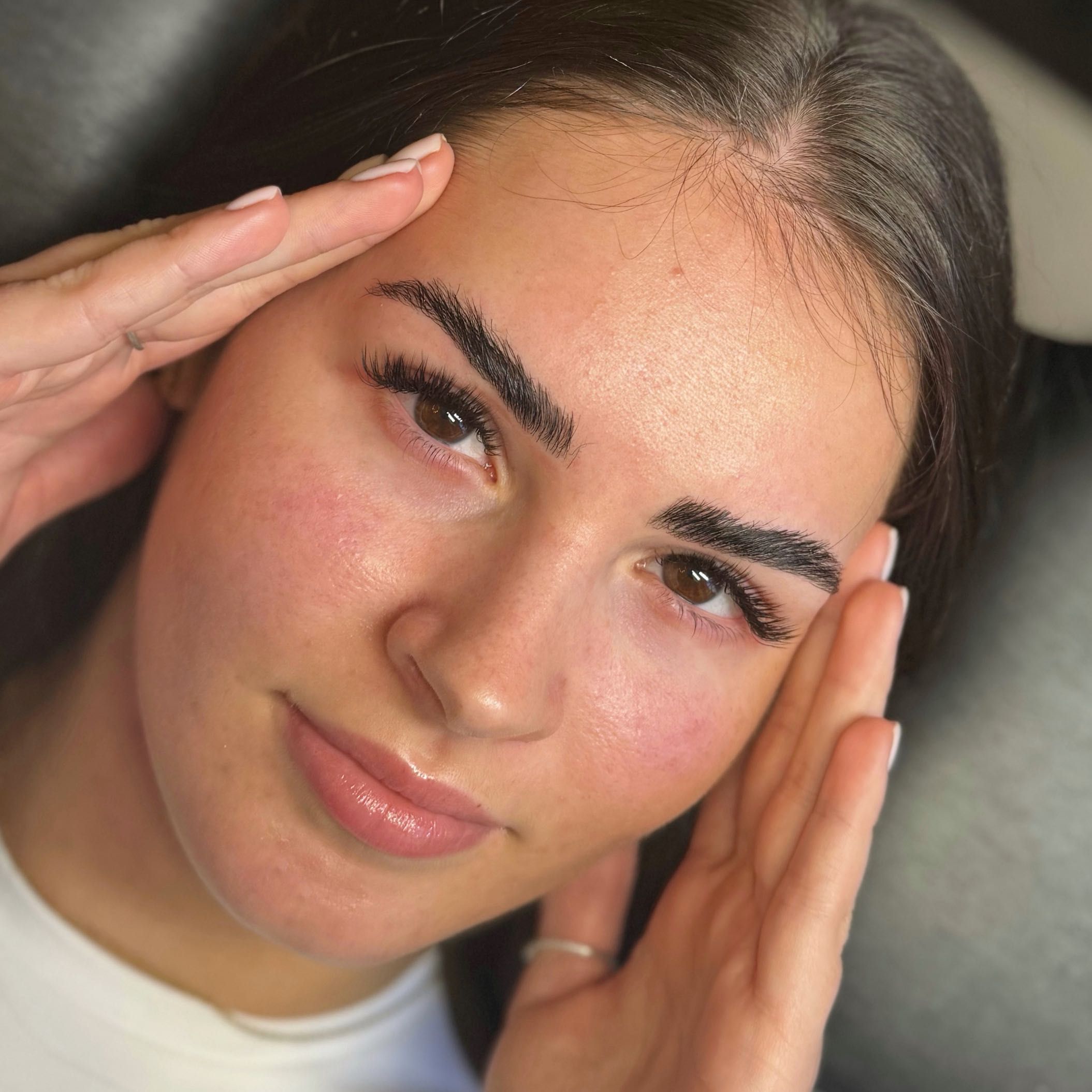 Detailed lash and brow styling by Minola Moss